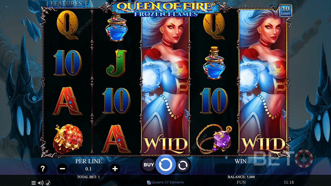 Nikmati Expanding Wilds di game dasar di slot Queen of Fire - Frozen Flames